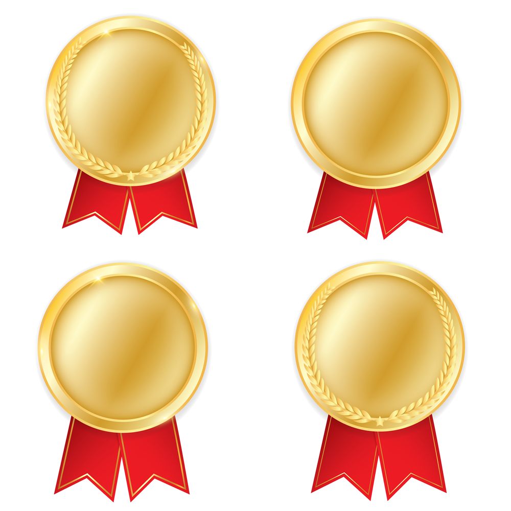 Four gold medals with red ribbons on a white background